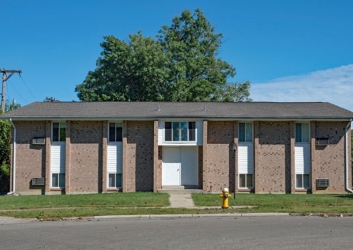 The exterior of an apartment building.