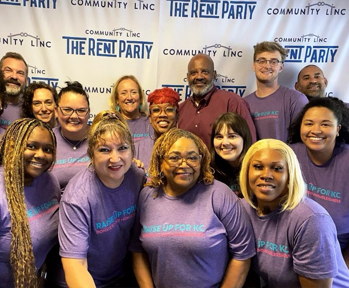 A team photo of Community Linc workers supporting The Rent Party event.