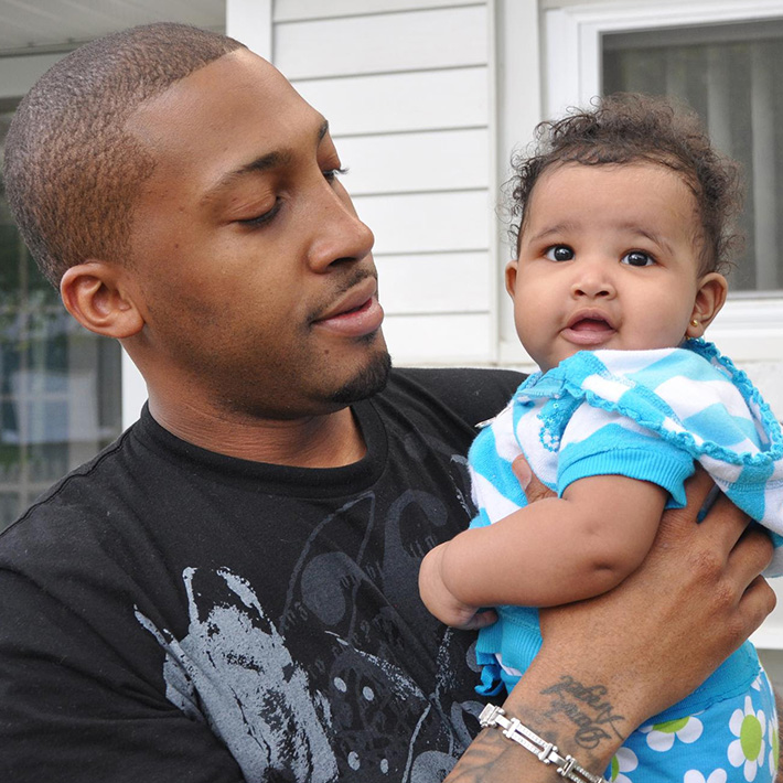 A father and child benefiting from life coaching.