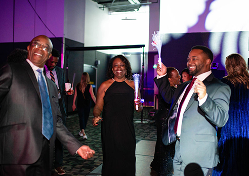 Attendees enjoying themselves at a Community Linc event.