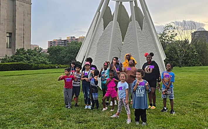 KIds in front of Nelson Atkins Museum of Art