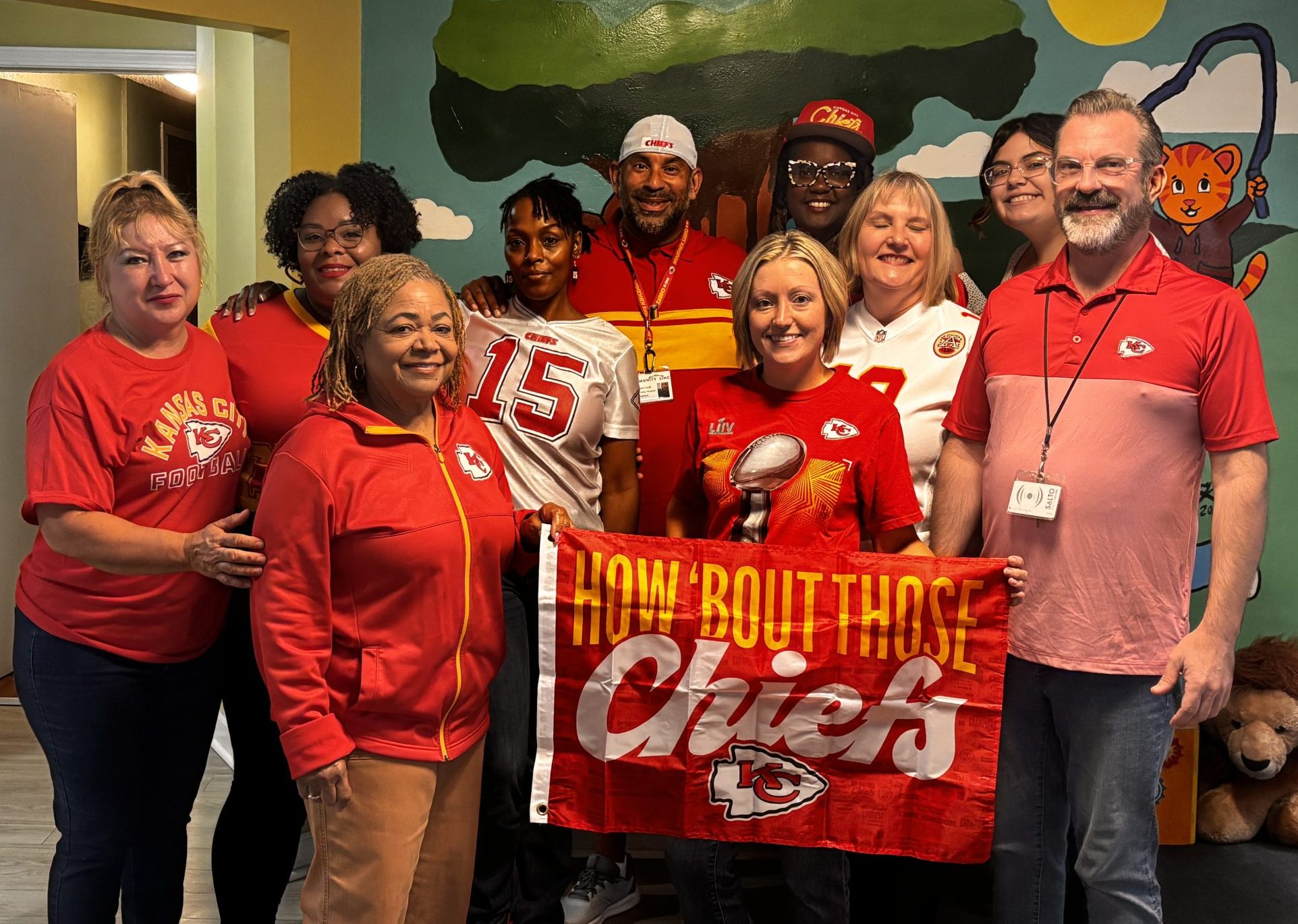 The staff of Community LINC decked out in Chiefs attire.